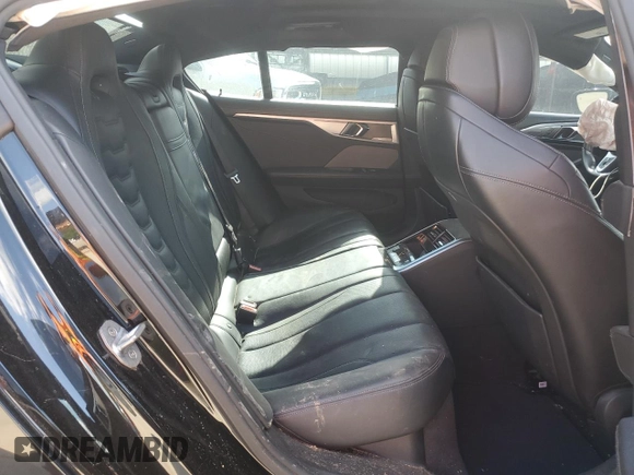 2020 BMW 8 Series M850i z VIN WBAGV8C08LCD46679, wystawiony jako Copart lot #56163785 z przebiegiem Nie podano mil oraz Czysty tytuł • Clean title. Historia ofert i sprzedaży dostępna na DreamBid. Obrazek 10.