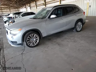 2015 BMW X1 sDrive28i with VIN WBAVM1C57FVW57426, listed as a Copart auction lot 50393415 with NaN miles and Clean Title. Bid and sale history available at carsss.com. Image 1.