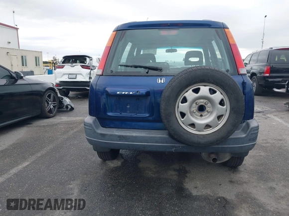 1999 Honda CR-V LX with VIN JHLRD1745XC014868, listed as a IAAI auction lot 41775272 with 212,835 mi miles. Bid and sale history available at carsss.com. Image 16.
