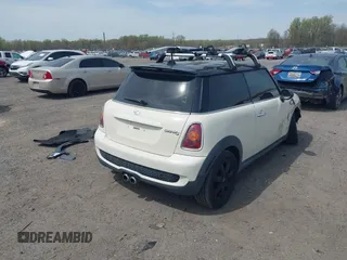 2007 MINI Hardtop S with VIN WMWMF73547TV31403, listed as a IAAI auction lot 42066433 with 156,730 mi miles and . Bid and sale history available at DreamBid. Image 4.