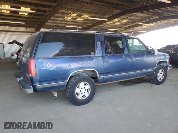 1995 Chevrolet Suburban z VIN 1GNFK16K9SJ333918, wystawiony jako Copart lot #46665205 z przebiegiem 208 395 mil mil oraz Czysty tytuł • Clean title. Historia ofert i sprzedaży dostępna na DreamBid. Obrazek 3.