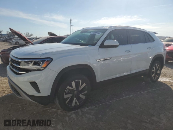 2023 Volkswagen Atlas SE z VIN 1V2DC2CA5PC214689, wystawiony jako Copart lot #77497274 z przebiegiem 29 838 mil mil oraz Nie do naprawy • Non repairable. Historia ofert i sprzedaży dostępna na DreamBid. Obrazek 1.