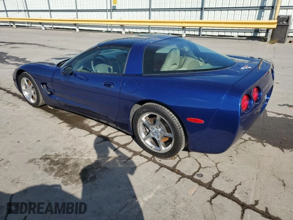 2004 Chevrolet Corvette with VIN 1G1YY22G145132963, listed as a Copart auction lot 74264184 with 74,077 mi miles and Salvage Title. Bid and sale history available at carsss.com. Image 2.