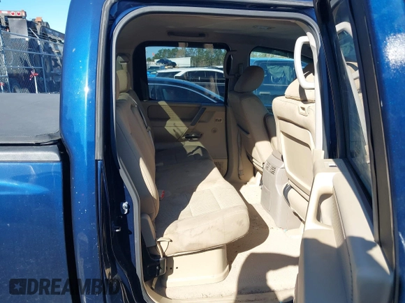 2011 Nissan Titan SL with VIN 1N6AA0EC0BN323844, listed as a IAAI auction lot 41768462 with 106,732 mi miles. Bid and sale history available at carsss.com. Image 8.