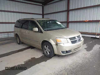 2010 Dodge Grand Caravan SXT with VIN 2D4RN5D17AR496854, listed as a IAAI auction lot 42210738 with 213,121 mi miles and . Bid and sale history available at DreamBid. Image 1.