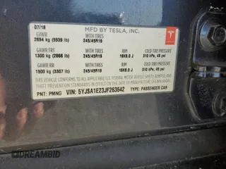 2018 Tesla Model S 75D z VIN 5YJSA1E23JF263642, wystawiony jako Copart lot #50647665 z przebiegiem 71 416 mil mil oraz Szkoda całkowita • Salvage title. Historia ofert i sprzedaży dostępna na DreamBid. Obrazek 13.
