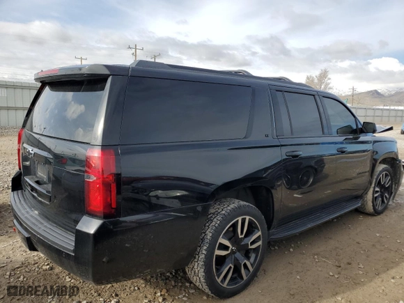 2019 Chevrolet Suburban LT with VIN 1GNSKHKC5KR291660, listed as a Copart auction lot 51587645 with 107,786 mi miles and Salvage Title. Bid and sale history available at carsss.com. Image 3.