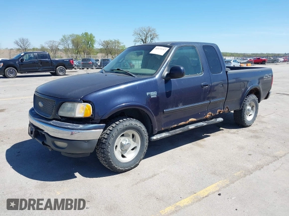 2000 Ford F-150 XL with VIN 1FTRX18LXYNB41132, listed as a IAAI auction lot 42173717 with Not provided miles and . Bid and sale history available at DreamBid. Image 2.