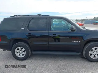 2009 GMC Yukon SLT 4SB with VIN 1GKFK33049R209059, listed as a IAAI auction lot 41673686 with 206,570 mi miles and . Bid and sale history available at DreamBid. Image 13.