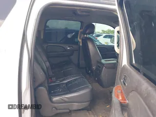 2011 Chevrolet Suburban LT with VIN 1GNSCJE09BR150452, listed as a IAAI auction lot 42655961 with 208,311 mi miles and . Bid and sale history available at DreamBid. Image 8.