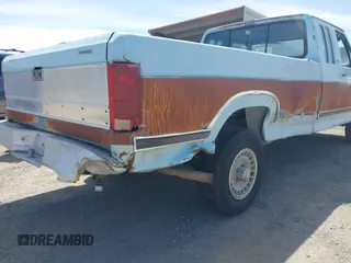 1986 Ford F-150 with VIN 1FTEX14N8GKA92289, listed as a IAAI auction lot 42089084 with 33,539 mi miles. Bid and sale history available at carsss.com. Image 6.