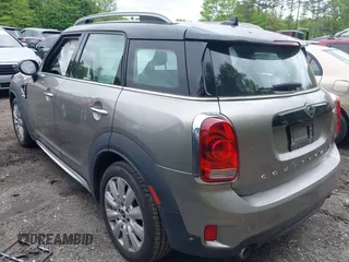 2020 MINI Countryman Cooper S with VIN WMZYX1C06L3L47965, listed as a IAAI auction lot 42277163 with 18,807 mi miles and . Bid and sale history available at DreamBid. Image 3.