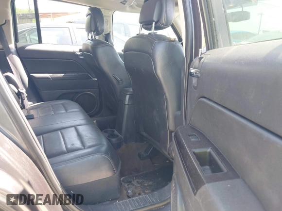 2016 Jeep Patriot Latitude with VIN 1C4NJRFB7GD658594, listed as a IAAI auction lot 42066483 with 146,492 mi miles. Bid and sale history available at carsss.com. Image 8.