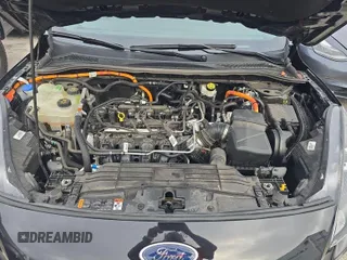 2021 Ford Escape SEL Hybrid with VIN 1FMCU0CZ4MUA54097, listed as a IAAI auction lot 42566428 with 45,342 mi miles and . Bid and sale history available at DreamBid. Image 8.