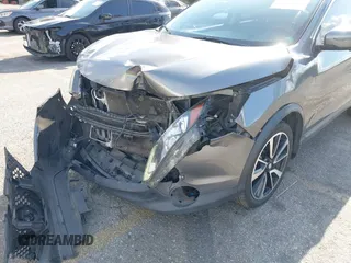 2017 Nissan Rogue S z VIN JN1BJ1CP1HW002968, wystawiony jako IAAI lot #41896777 z przebiegiem 128 583 mil mil oraz . Historia ofert i sprzedaży dostępna na DreamBid. Obrazek 6.