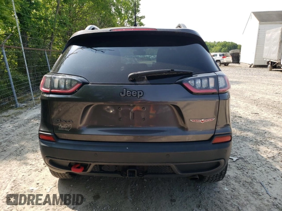 2019 Jeep Cherokee Trailhawk Elite с VIN 1C4PJMBN5KD123705, выставлен на аукционе Copart как лот 58827215 с пробегом 56 913 миль миль и Списание • Salvage title. История ставок и продаж доступна на DreamBid. Изображение 6.