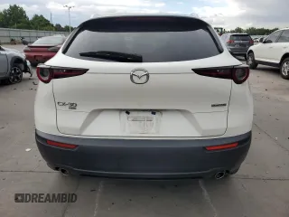 2022 Mazda CX-30 S Select with VIN 3MVDMBBL9NM411859, listed as a Copart auction lot 59875745 with 52,878 mi miles and Salvage title. Bid and sale history available at DreamBid. Image 6.
