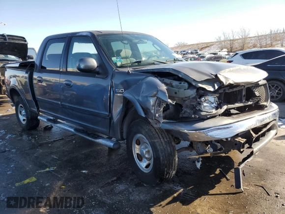 2003 Ford F-150 XLT with VIN 1FTRW08673KA38056, listed as a Copart auction lot 42772435 with 129,104 mi miles and Salvage Title. Bid and sale history available at carsss.com. Image 4.