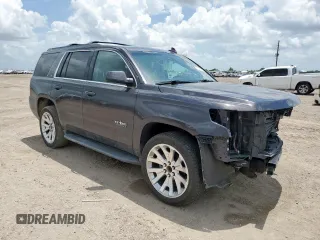 2018 Chevrolet Tahoe LT with VIN 1GNSCBKC8JR135511, listed as a Copart auction lot 60357095 with 123,904 mi miles and Salvage title. Bid and sale history available at DreamBid. Image 4.