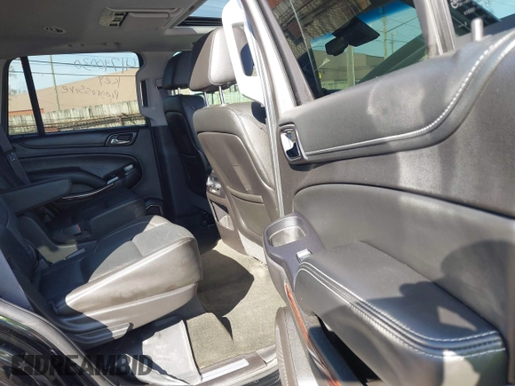 2016 GMC Yukon SLT with VIN 1GKS2BKC5GR253038, listed as a IAAI auction lot 41790030 with 101,039 mi miles. Bid and sale history available at carsss.com. Image 8.