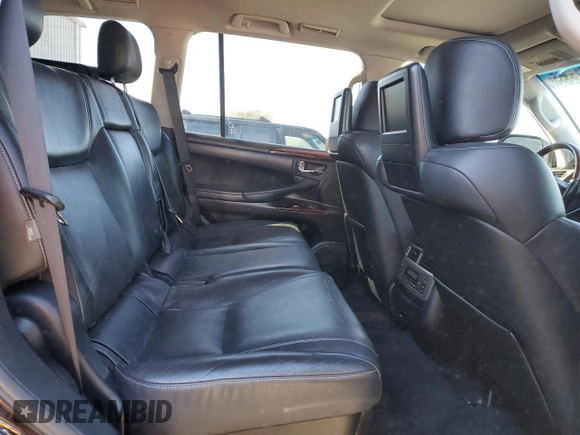 2015 Lexus LX 570 with VIN JTJHY7AX5F4173513, listed as a Copart auction lot 87815355 with 141,915 mi miles and Salvage Title. Bid and sale history available at DreamBid. Image 11.
