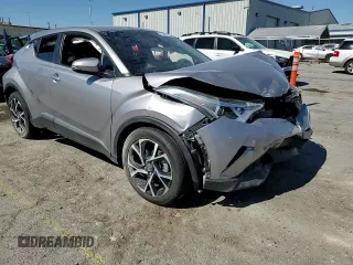 2018 Toyota C-HR XLE z VIN NMTKHMBX5JR014024, wystawiony jako Copart lot #56367465 z przebiegiem 79 882 mil mil oraz Szkoda całkowita • Salvage title. Historia ofert i sprzedaży dostępna na DreamBid. Obrazek 13.
