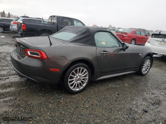 2017 FIAT 124 Spider Lusso with VIN JC1NFAEK6H0119720, listed as a Copart auction lot 83887024 with 77,452 mi miles and Salvage Title. Bid and sale history available at carsss.com. Image 3.