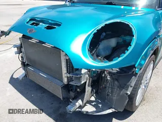 2017 MINI Convertible Cooper S z VIN WMWWG9C30H3C80917, wystawiony jako IAAI lot #42227320 z przebiegiem 38 490 mil mil oraz . Historia ofert i sprzedaży dostępna na DreamBid. Obrazek 18.