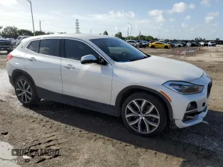 2018 BMW X2 xDrive28i with VIN WBXYJ5C38JEF74486, listed as a Copart auction lot 70311644 with 45,730 mi miles and Salvage Title. Bid and sale history available at carsss.com. Image 4.