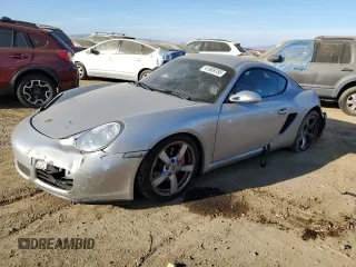 2006 Porsche Cayman S с VIN WP0AB29816U783317, выставлен на аукционе Copart как лот 41909785 с пробегом 95 635 миль миль и Списание • Salvage title. История ставок и продаж доступна на DreamBid. Изображение 1.