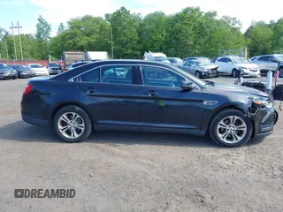 2015 Ford Taurus SEL with VIN 1FAHP2E88FG181055, listed as a IAAI auction lot 42307640 with 104,702 mi miles and . Bid and sale history available at DreamBid. Image 12.