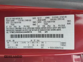 2018 Ford Escape SE z VIN 1FMCU9GD4JUA49819, wystawiony jako Copart lot #73023734 z przebiegiem 96 228 mil mil oraz Szkody całkowita. Historia ofert i sprzedaży dostępna na DreamBid. Obrazek 13.