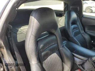 2004 Chevrolet Corvette with VIN 1G1YY22G145116083, listed as a Copart auction lot 52054735 with 158,087 mi miles and Salvage Title. Bid and sale history available at carsss.com. Image 10.