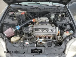 1996 Honda Civic EX z VIN 1HGEJ8146TL091427, wystawiony jako Copart lot #53537235 z przebiegiem 132 490 mil mil oraz Szkoda całkowita • Salvage title. Historia ofert i sprzedaży dostępna na DreamBid. Obrazek 11.