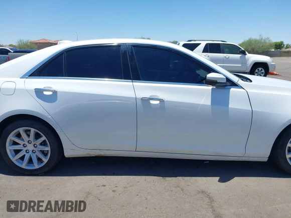 2015 Cadillac CTS Luxury RWD with VIN 1G6AR5SX7F0106703, listed as a IAAI auction lot 42607622 with 79,539 mi miles and . Bid and sale history available at DreamBid. Image 13.