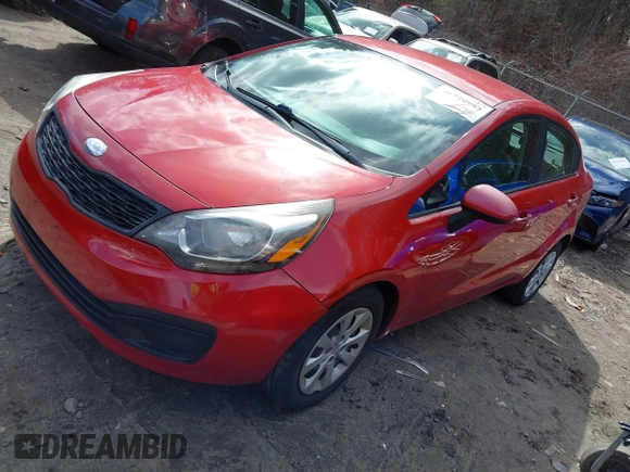 2014 Kia Rio LX with VIN KNADM4A31E6370963, listed as a IAAI auction lot 41720980 with 112,551 mi miles and . Bid and sale history available at DreamBid. Image 2.