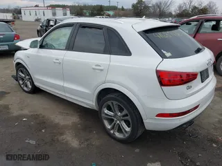 2018 Audi Q3 Premium with VIN WA1ECCFS1JR015959, listed as a IAAI auction lot 41687436 with 126,924 mi miles. Bid and sale history available at carsss.com. Image 3.