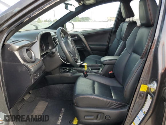 2016 Toyota RAV4 SE with VIN 2T3JFREV9GW453907, listed as a Copart auction lot 60438385 with 59,288 mi miles and Salvage title. Bid and sale history available at DreamBid. Image 7.