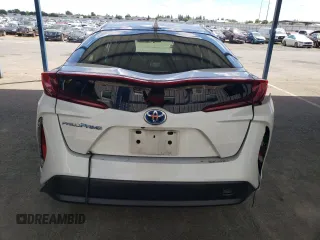2022 Toyota Prius LE with VIN JTDKAMFP4N3197665, listed as a Copart auction lot 57339955 with 61,063 mi miles and Salvage title. Bid and sale history available at DreamBid. Image 6.