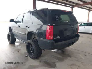2007 GMC Yukon SLE w/3SA with VIN 1GKFC13C27R307371, listed as a IAAI auction lot 41569424 with 355,074 mi miles. Bid and sale history available at carsss.com. Image 3.