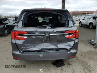 2022 Honda Odyssey Touring with VIN 5FNRL6H85NB023052, listed as a Copart auction lot 50884735 with 54,952 mi miles and Salvage Title. Bid and sale history available at DreamBid. Image 6.