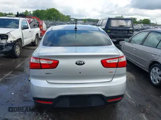 2014 Kia Rio LX with VIN KNADM4A31E6413780, listed as a IAAI auction lot 41996928 with 93,446 mi miles and . Bid and sale history available at DreamBid. Image 16.