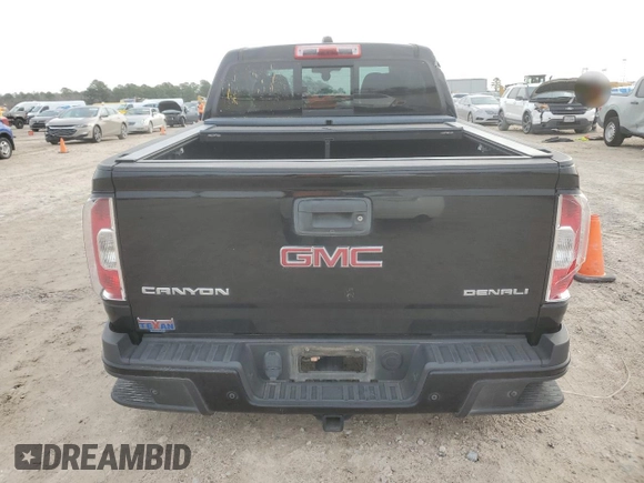 2019 GMC Canyon 4WD Denali with VIN 1GTG6EEN6K1111583, listed as a Copart auction lot 88544395 with 75,454 mi miles and Salvage Title. Bid and sale history available at carsss.com. Image 6.