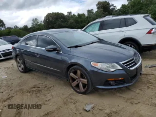 2012 Volkswagen CC Lux PZEV with VIN WVWHP7AN7CE508247, listed as a Copart auction lot 64228054 with 201,234 mi miles and Salvage Title. Bid and sale history available at carsss.com. Image 4.