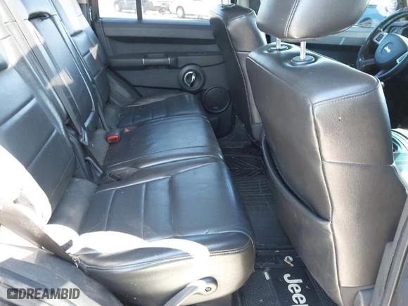 2010 Jeep Commander Sport with VIN 1J4RG4GKXAC156977, listed as a IAAI auction lot 41813409 with NaN miles. Bid and sale history available at carsss.com. Image 8.
