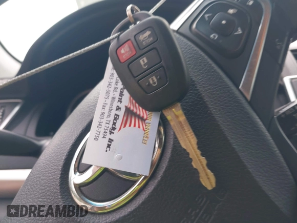 2015 Toyota Camry XLE with VIN 4T1BF1FKXFU891434, listed as a IAAI auction lot 42119108 with 142,736 mi miles and . Bid and sale history available at DreamBid. Image 11.