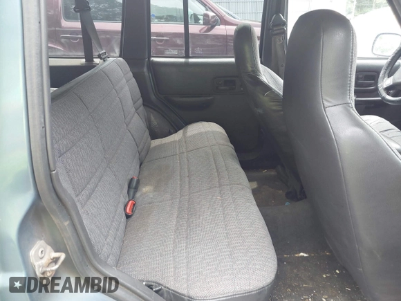 1999 Jeep Cherokee Sport with VIN 1J4FF68S3XL608860, listed as a IAAI auction lot 42777688 with 248,505 mi miles and . Bid and sale history available at DreamBid. Image 8.