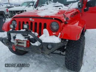 2015 Jeep Wrangler Unlimited Rubicon with VIN 1C4BJWFG7FL646463, listed as a IAAI auction lot 41537553 with 97,412 mi miles. Bid and sale history available at carsss.com. Image 6.