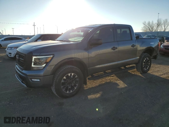 2024 Nissan Titan Pro-4X with VIN 1N6AA1ED7RN106901, listed as a Copart auction lot 43573995 with 42,973 mi miles and Salvage title. Bid and sale history available at DreamBid. Image 1.