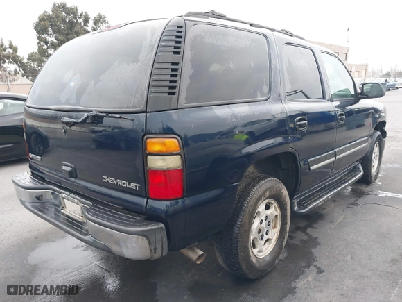 2004 Chevrolet Tahoe LS with VIN 1GNEC13T64J195165, listed as a IAAI auction lot 41446654 with 351,992 mi miles. Bid and sale history available at carsss.com. Image 4.
